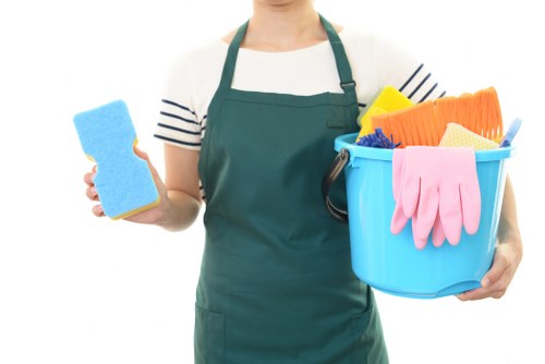 After builders cleaning in a renovated room with dust removal tools